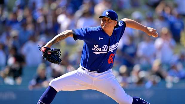 Aug 13, 2023; Los Angeles, California, USA; Los Angeles Dodgers relief pitcher VIctor Gonzalez (81) throws a scoreless ninth inning defeating the Colorado Rockies at Dodger Stadium.